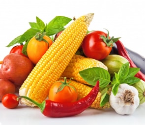 Various vegetables stacked up in a pile for the 'heirloom vegetable seed' selection